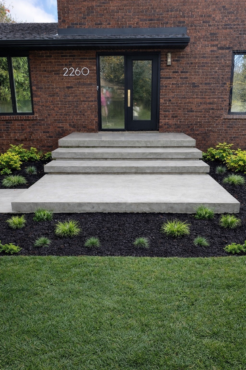 Custom entry steps and lawn