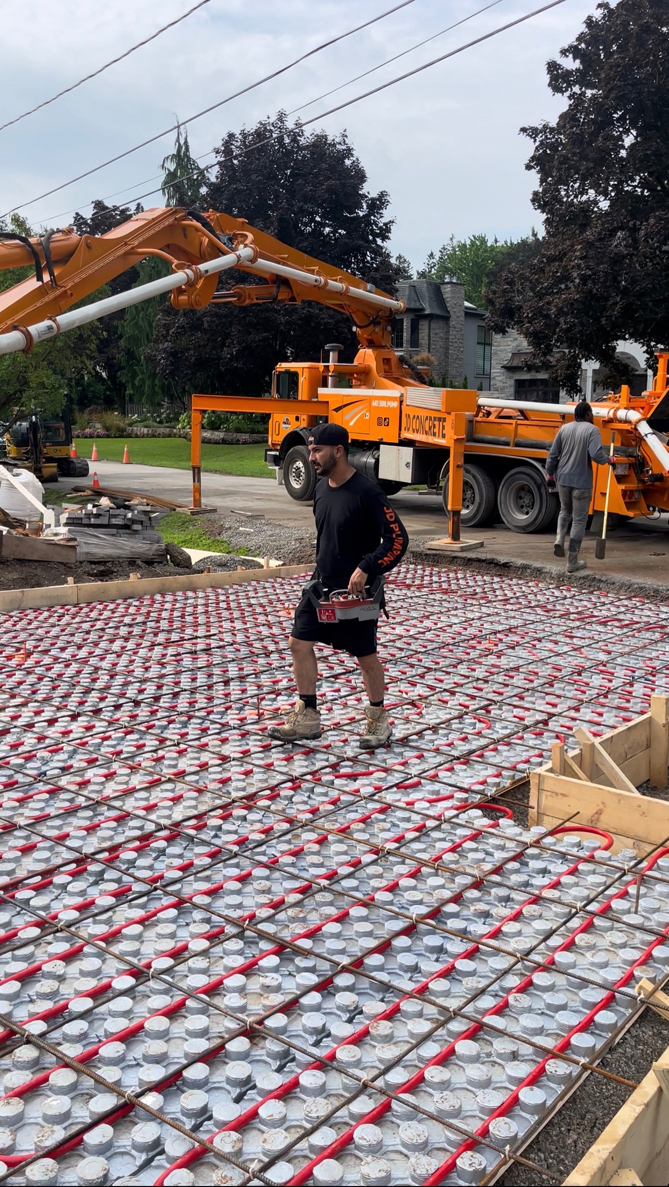 Heated driveway concrete pour with rebar